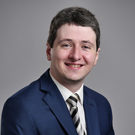 Head shot of Sean Mcguire, Analyst